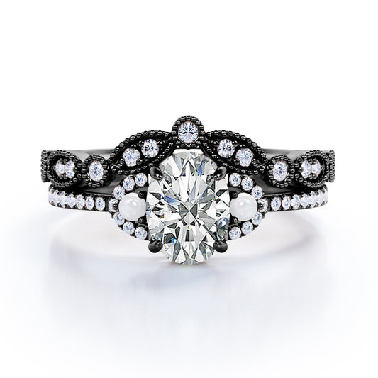 Artistic art deco inspired 1.5 carat Oval shaped Moissanite, diamonds and pearls milgrain wedding ring set for women in Black gold