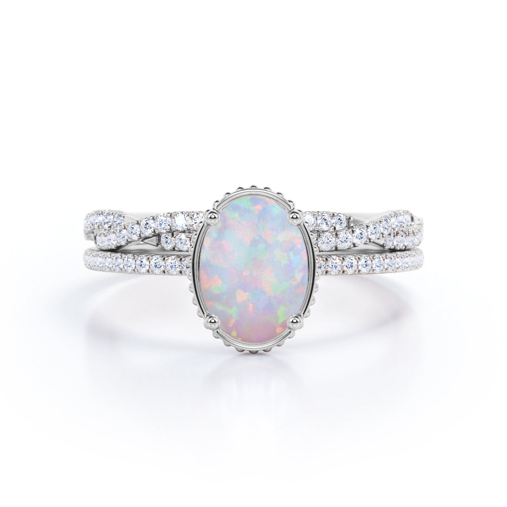 Milgrain halo 1.5 carat Oval cut Ethiopian Opal and diamond half-infinity Bridal set for her