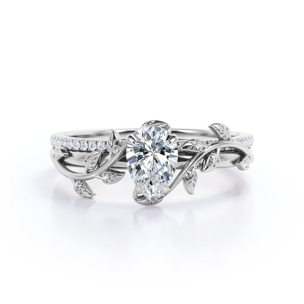 Stylish nature inspired 1.25 carat Pear cut Moissanite and diamond pave set wedding ring set for women