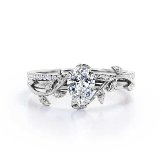 Stylish nature inspired 1.25 carat Pear cut Moissanite and diamond pave set wedding ring set for women