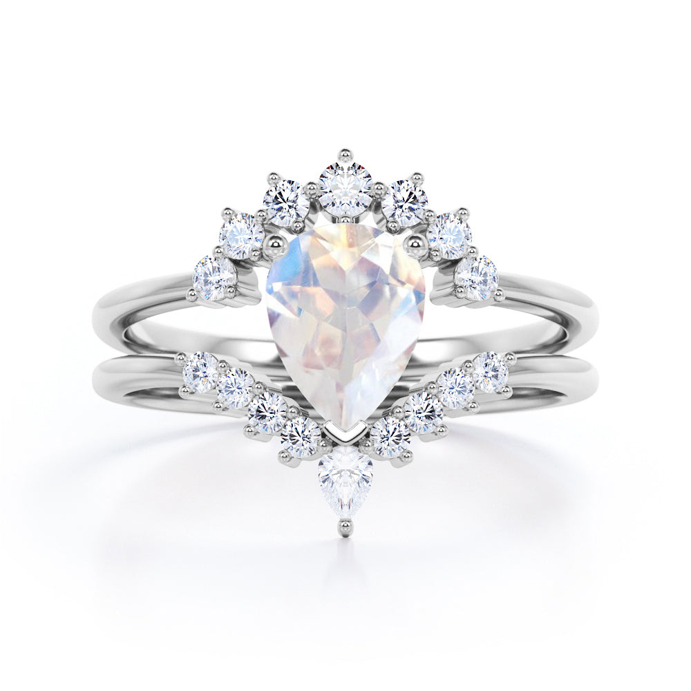Artisan 1.45 carat Brilliant Pear Blue Moonstone and diamond contoured wedding ring set for women in Rose gold