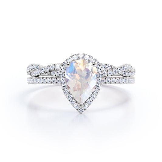 Exquisite 1.75 carat Pear cut Rainbow Moonstone Engagement ring with matching half eternity wedding ring band in gold