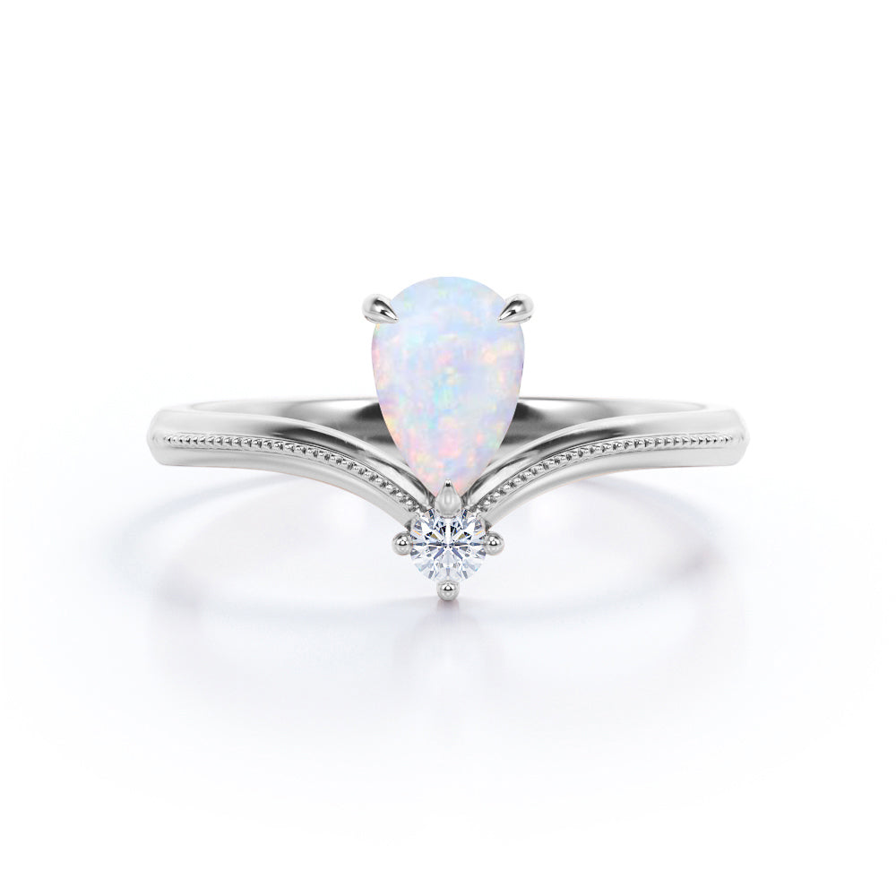 Mid-century Modern Almond shape 1 carat V-Shaped Ethiopian Opal and diamond Engagement ring in White gold