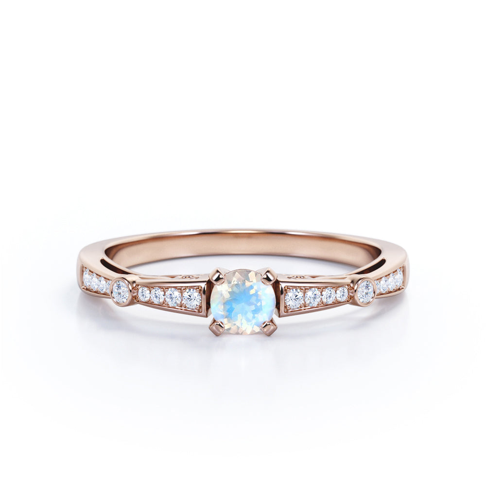Basket set 1.25 carat Round cut Blue Moonstone and Diamond tapered shank engagement ring in Yellow gold