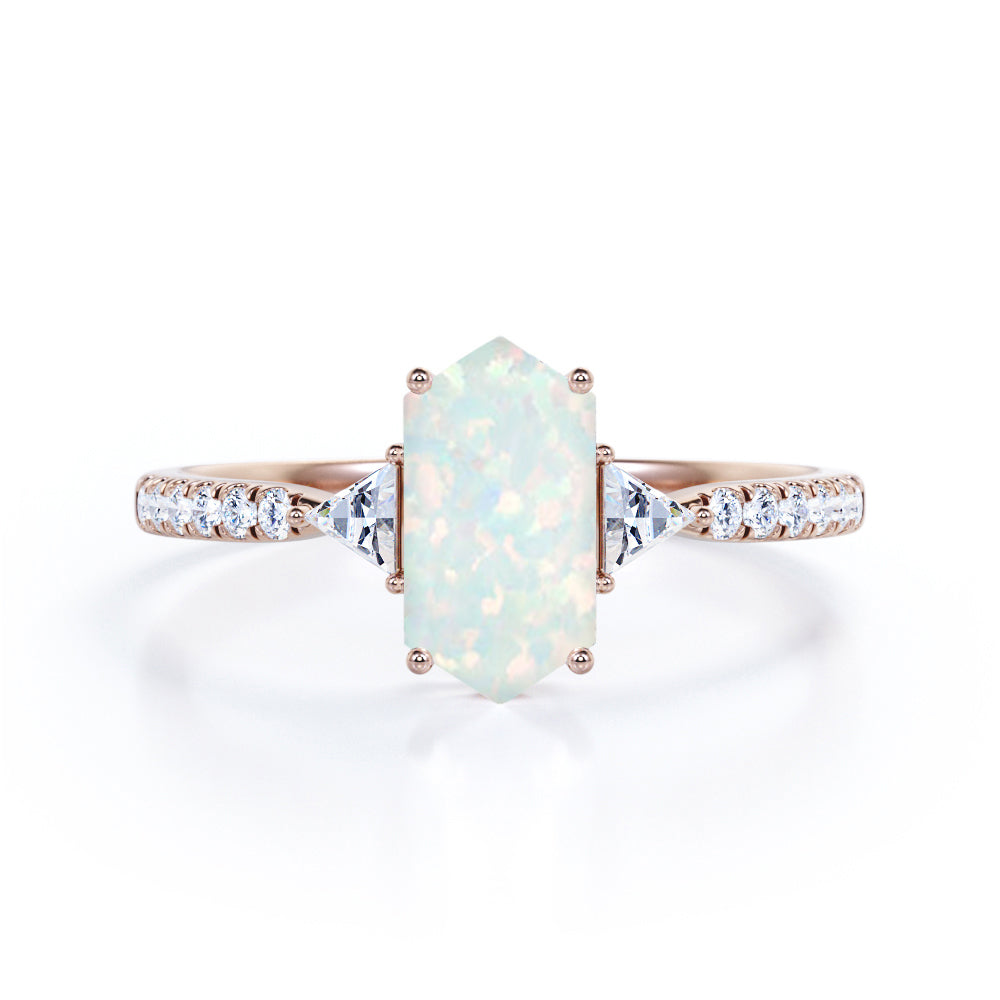Quadrilateral 3 stone 1.25 carat Hexagon cut Welo Opal and diamond trillion engagement ring in Black gold