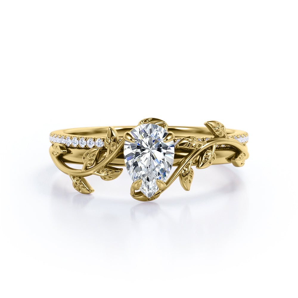 Stylish nature inspired 1.25 carat Pear cut Moissanite and diamond pave set wedding ring set for women