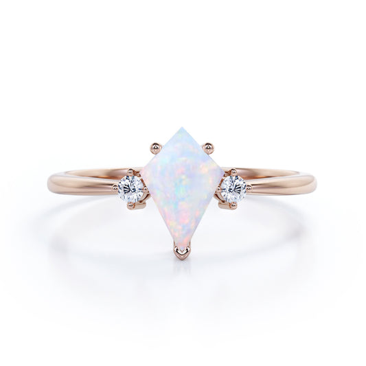 Timeless three stone 1.10 carat Kite shaped Fiery Opal and diamond prong style engagement ring in rose gold