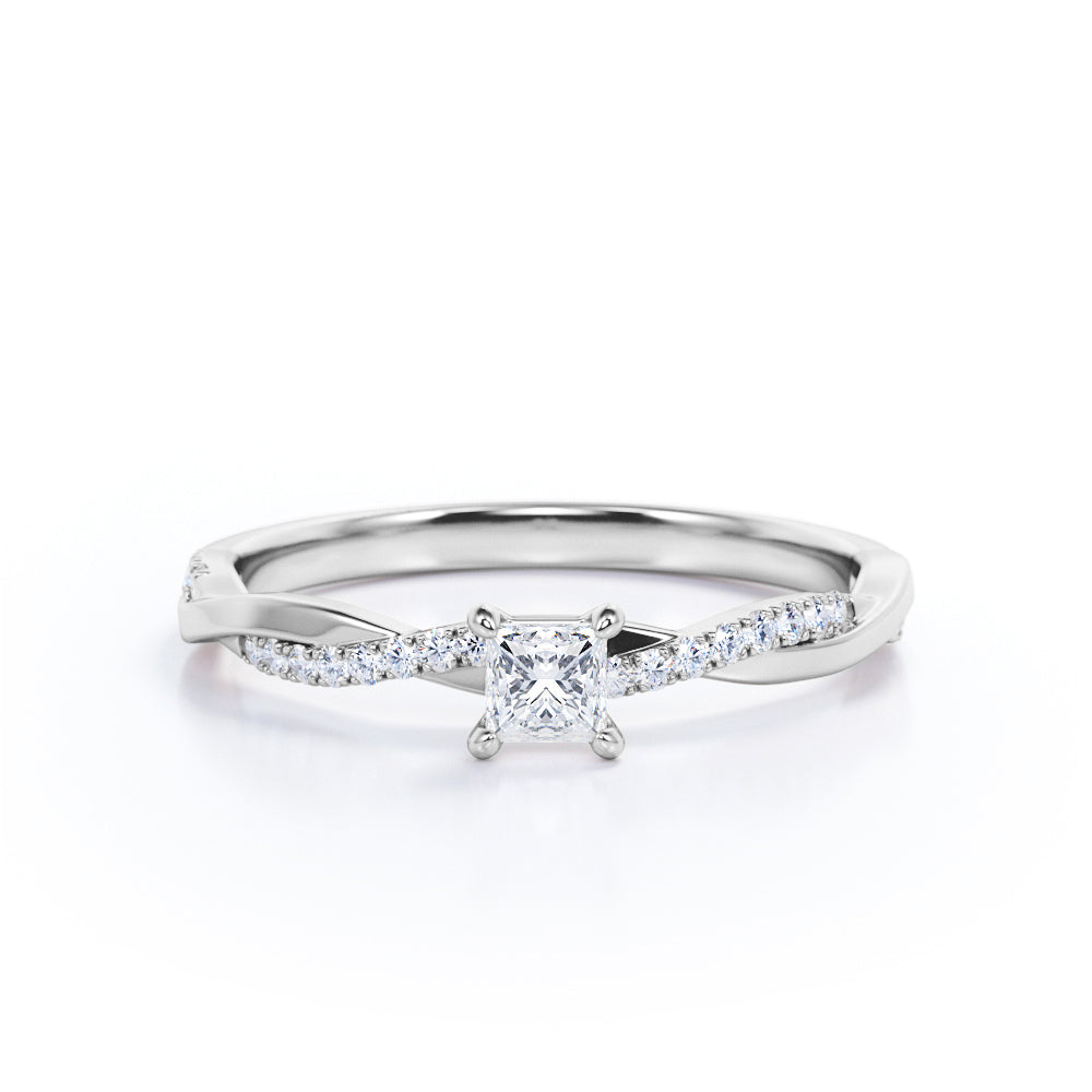 Twisted shank 0.5 carat Princess cut diamond infinity engagement ring in White gold