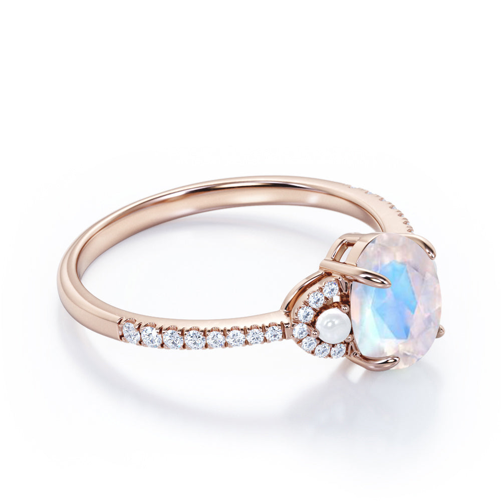 Pretty Pearls 1.5 carat Oval cut Moonstone and diamond traditional engagement ring in White gold