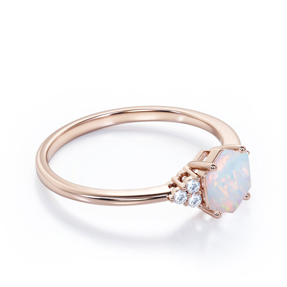 Geometric seven stone 1 carat Hexagon cut Opal and diamond basket set artisan engagement ring in Rose gold