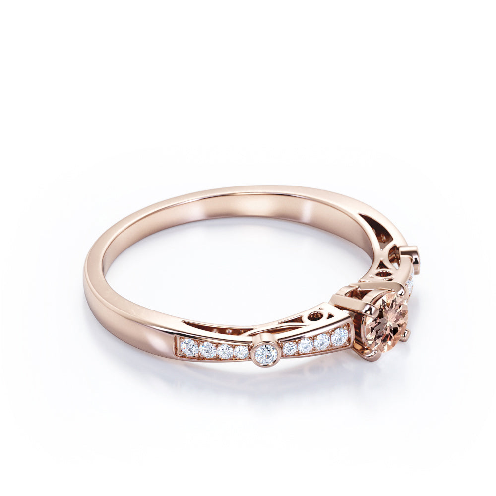 Prong style 0.75 carat Round cut Peach Pink Morganite and diamond tapered baguette engagement ring in White gold