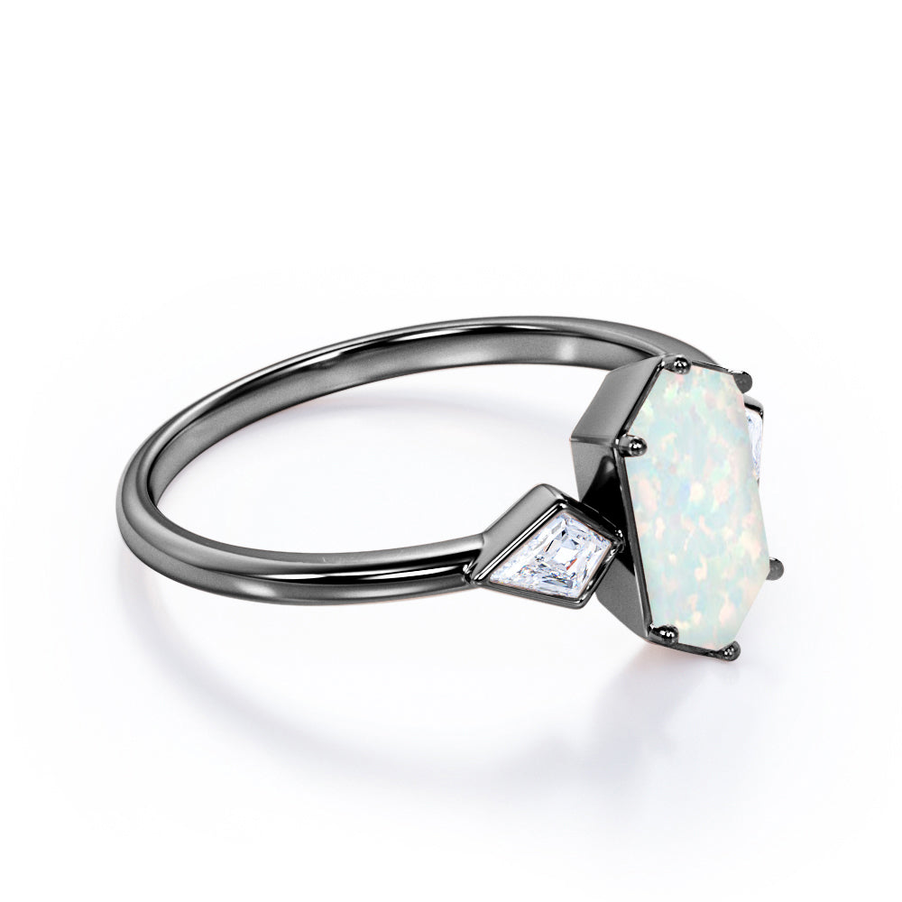 Elongated 1.10 carat Hexagonal Opal and marquise diamond bezel set engagement ring in Black gold