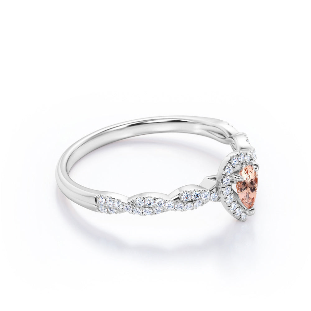 Twisted halo 1 carat Pear cut Morganite and diamond infinity engagement ring in Rose gold
