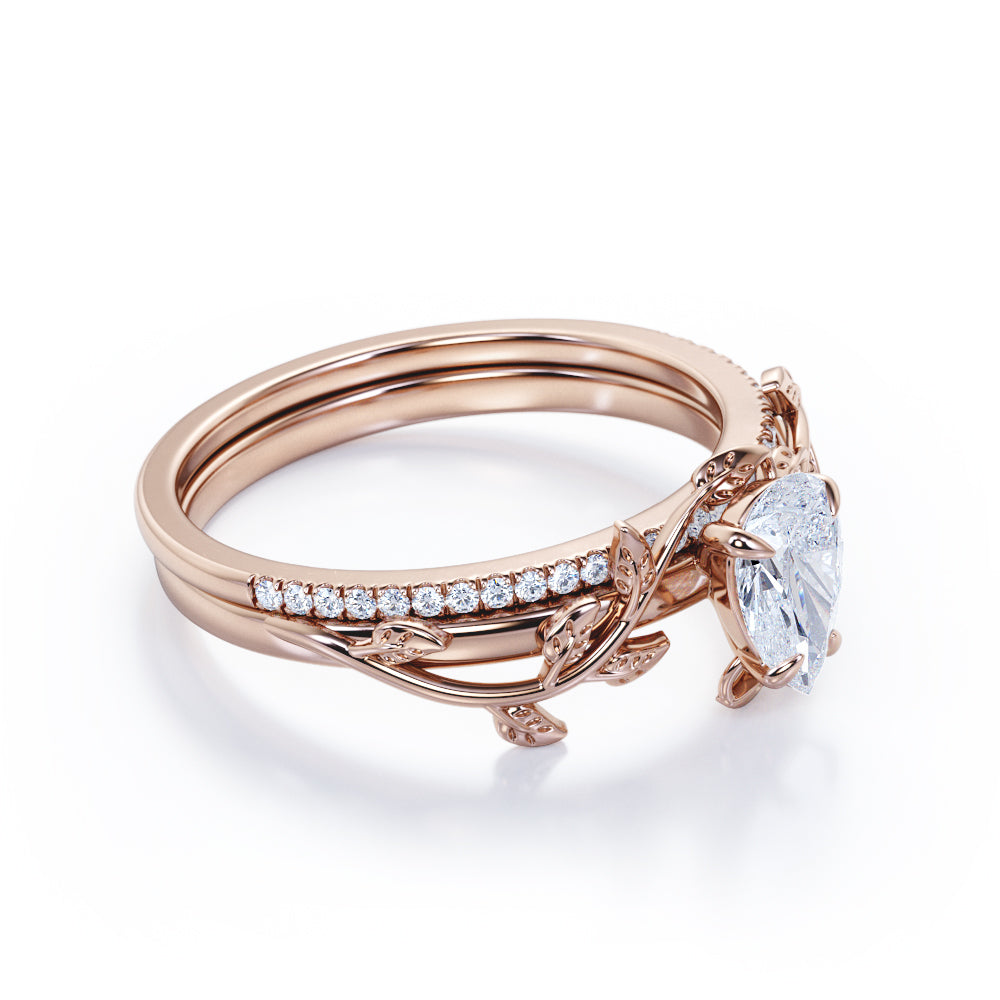 Stylish nature inspired 1.25 carat Pear cut Moissanite and diamond pave set wedding ring set for women