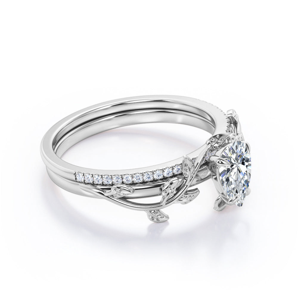 Stylish nature inspired 1.25 carat Pear cut Moissanite and diamond pave set wedding ring set for women