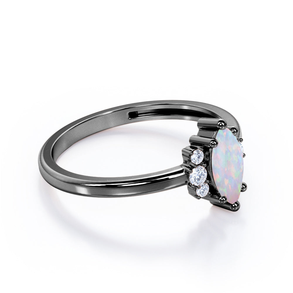Floral patterns 1.2 carat Marquise shape Ethiopian Opal and diamonds vintage style six prong engagement ring in Black gold