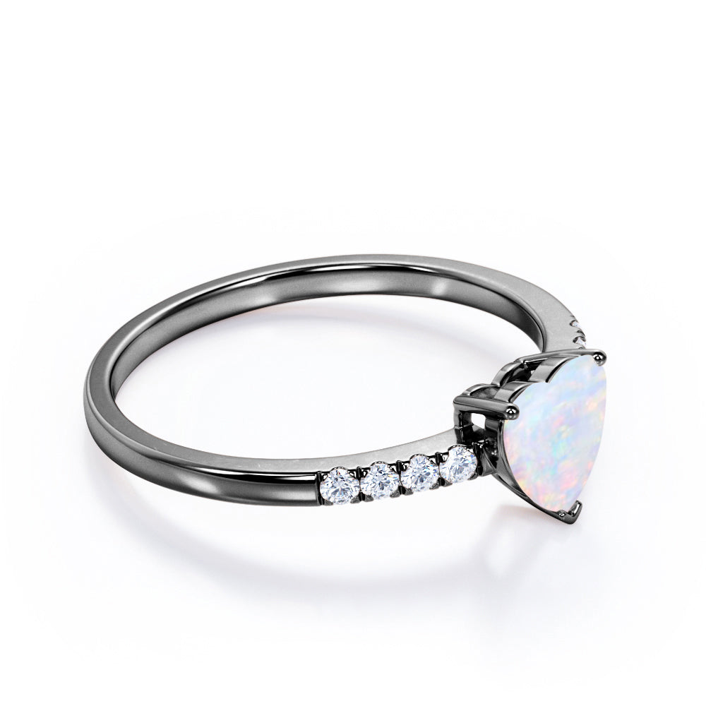 Vintage inspired 1.10 carat heart shaped Ethiopian Opal and diamond pave set engagement ring for her in Rose gold