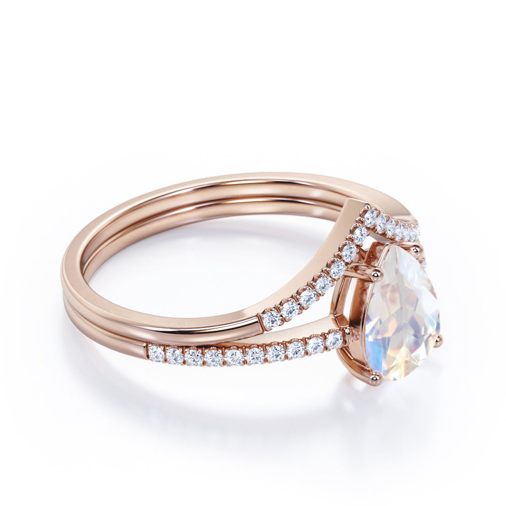 Magnificent 1.5 carat Pear cut Moonstone and diamond V-shaped wedding ring set in White gold