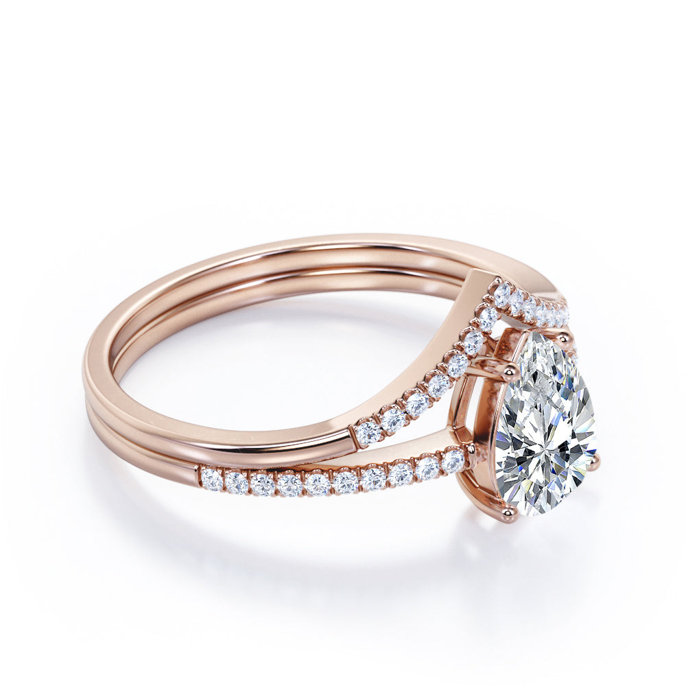 Vintage inspired 1.35 carat Pear cut Moissanite and diamond crown wedding ring set for women in rose gold