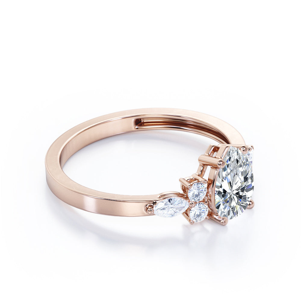 Elegant Beveled Edge 1.15 carat Pear cut Moissanite and diamond engagement ring in White gold