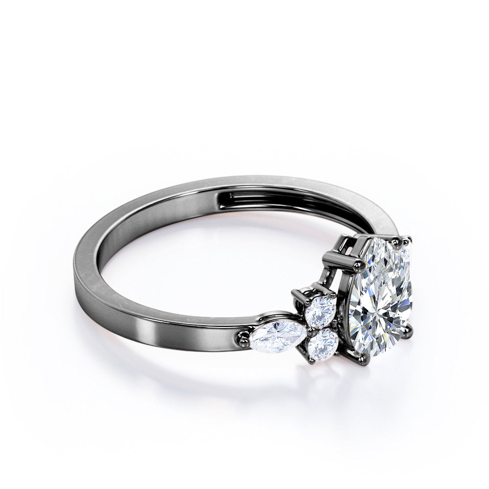 Elegant Beveled Edge 1.15 carat Pear cut Moissanite and diamond engagement ring in White gold