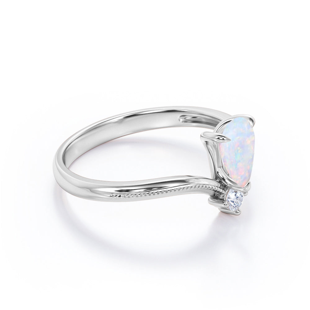 Mid-century Modern Almond shape 1 carat V-Shaped Ethiopian Opal and diamond Engagement ring in White gold