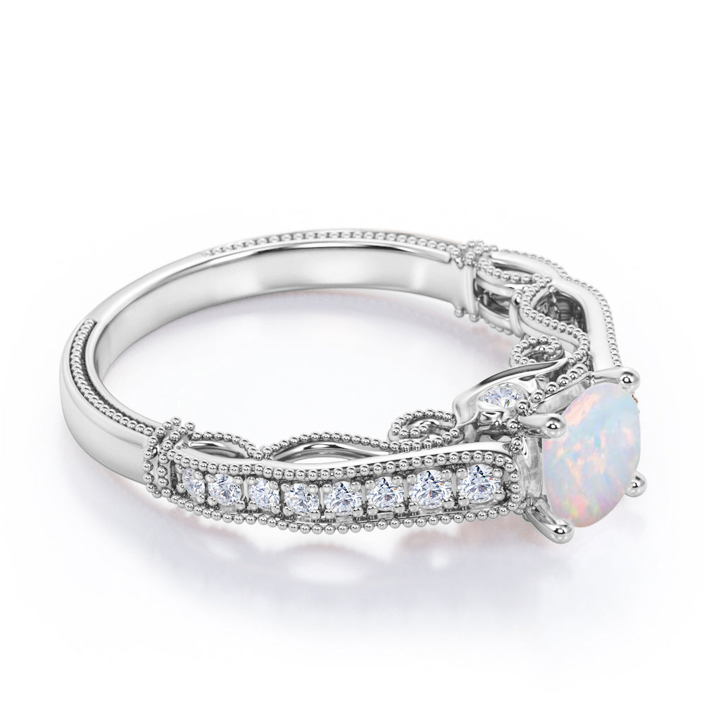 Art deco style 1.15 carat Round cut Australian Opal and diamond beaded engagement ring in Rose gold