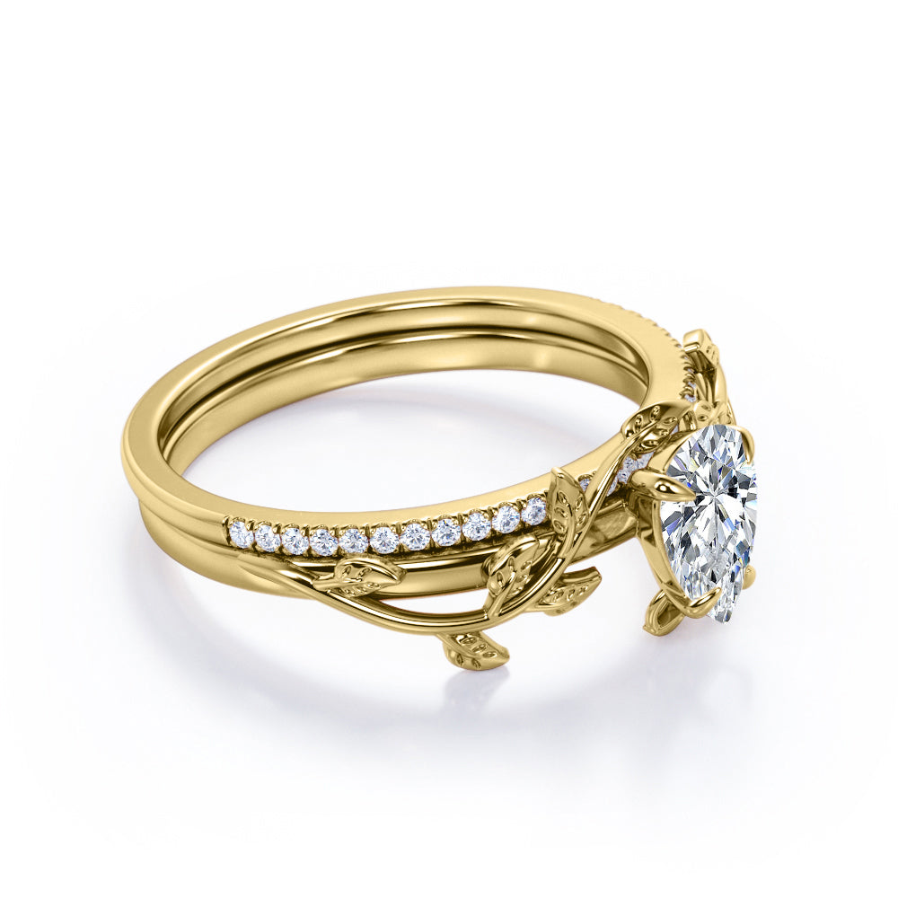 Stylish nature inspired 1.25 carat Pear cut Moissanite and diamond pave set wedding ring set for women