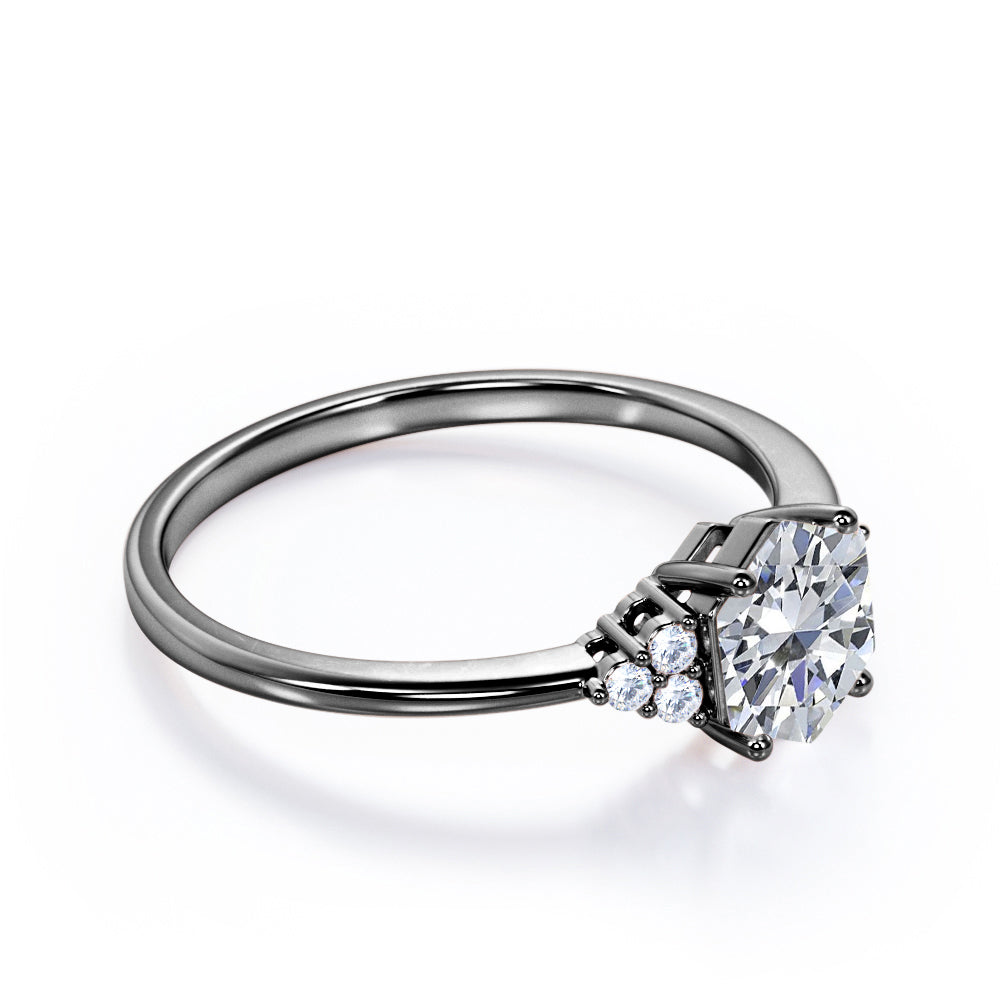 Modern 1 carat Hexagonal Moissanite and diamond tapered knife edge engagement ring in White gold