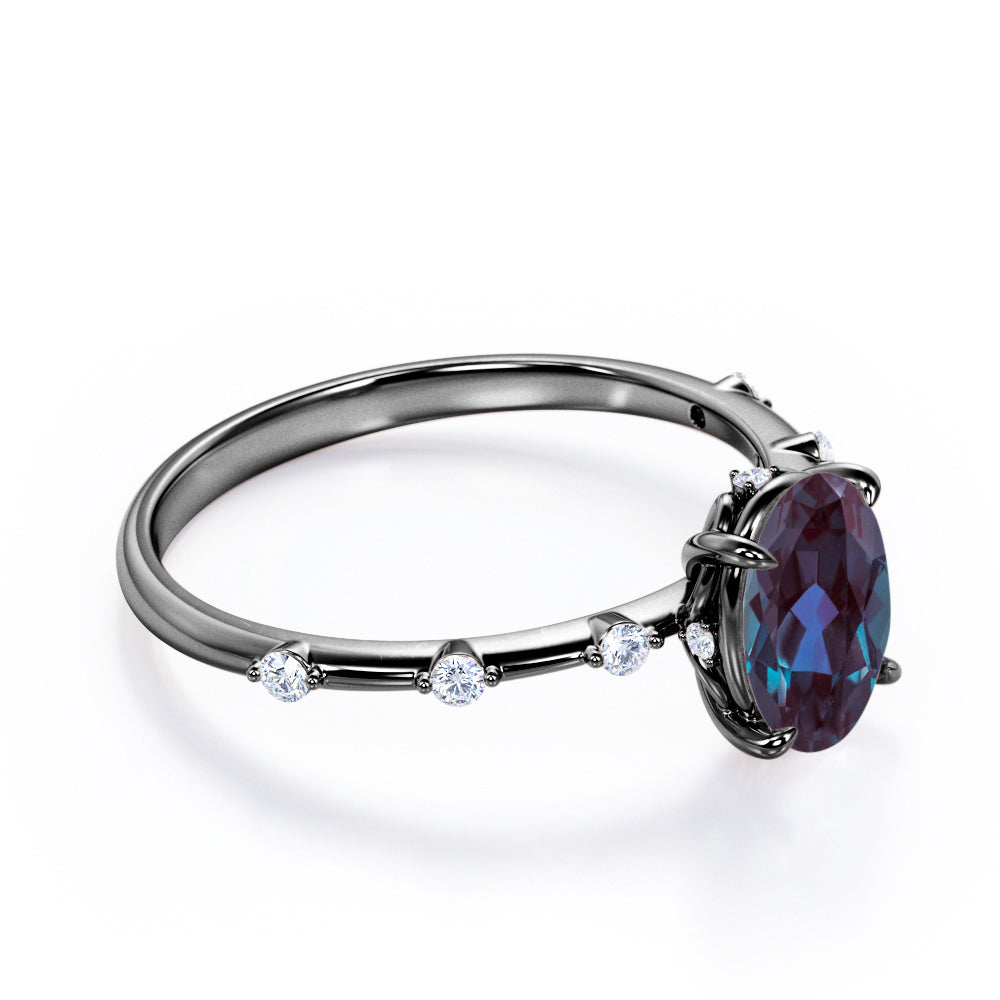 Twig style 1.1 carat Oval shaped Lab made Alexandrite and diamond nature inspired engagement ring in Black gold