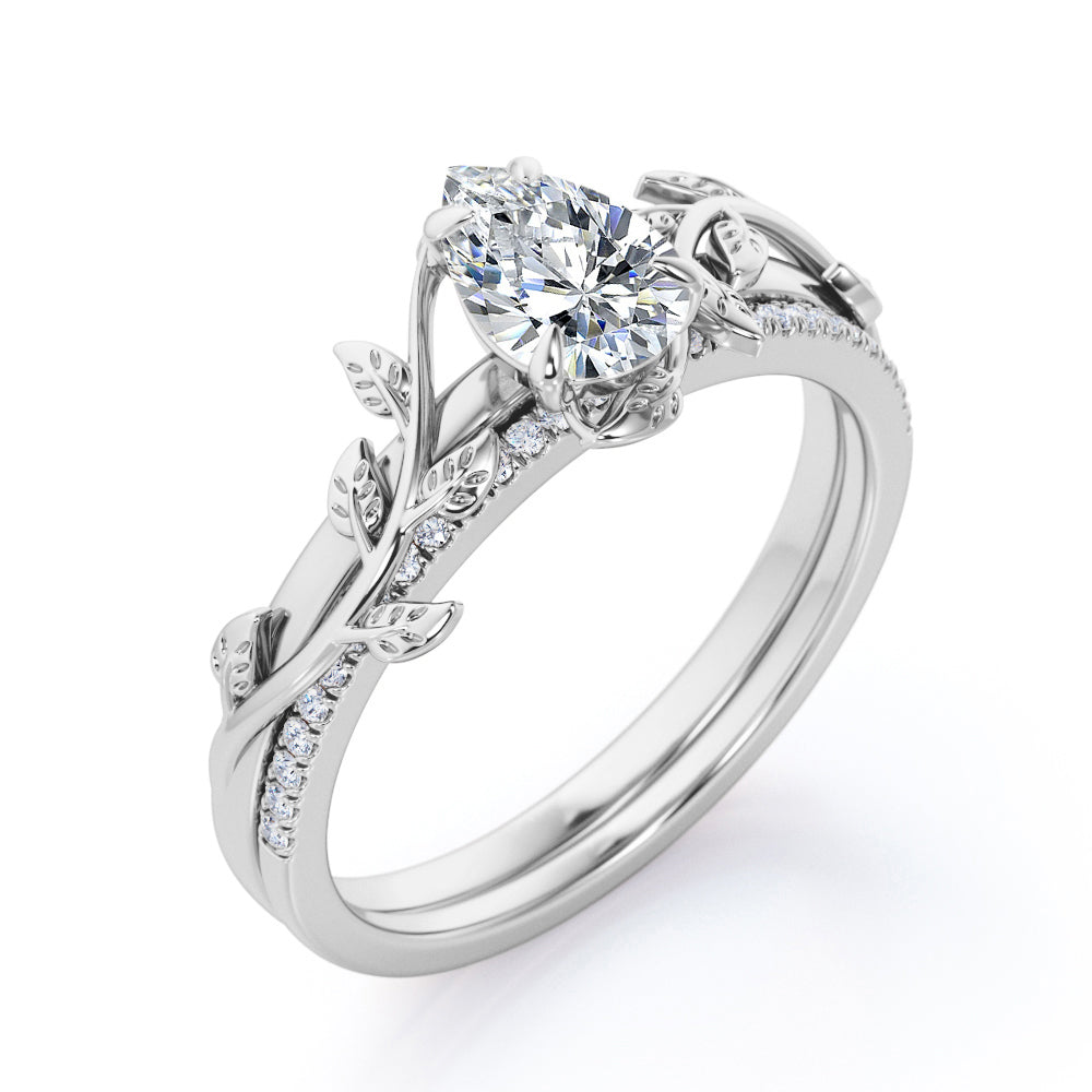 Stylish nature inspired 1.25 carat Pear cut Moissanite and diamond pave set wedding ring set for women