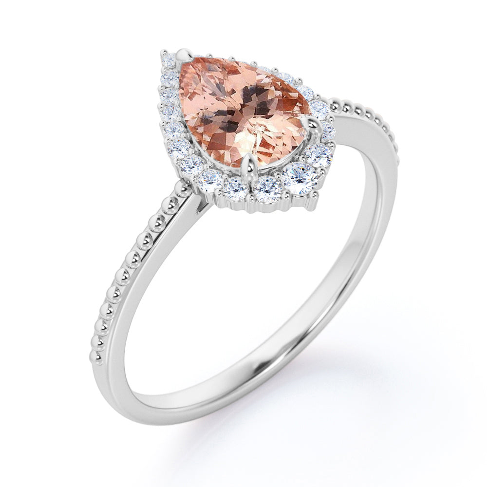 Eccentric Halo 1.25 carat Pear cut Morganite and diamond engraved vintage style engagement ring in Rose gold