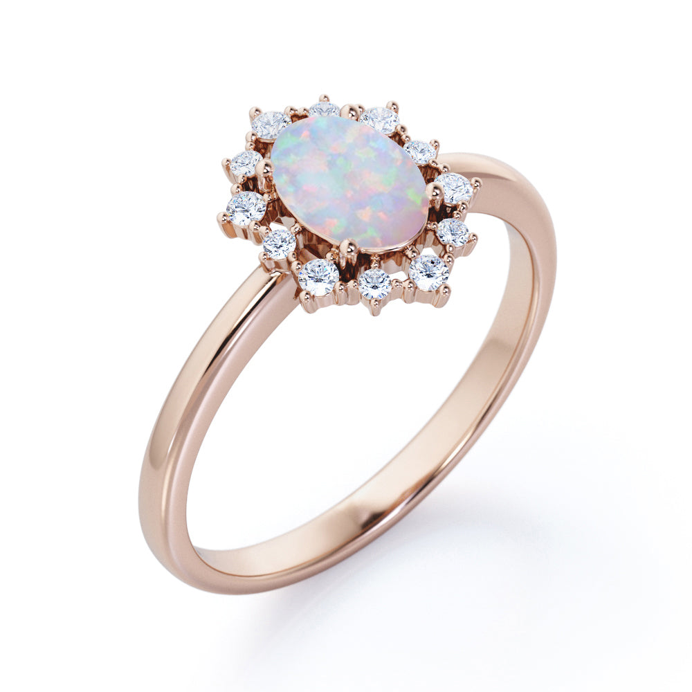Intricate cluster 1.15 carat Oval cut Ethiopian Opal and diamond art deco engagement ring in Black gold