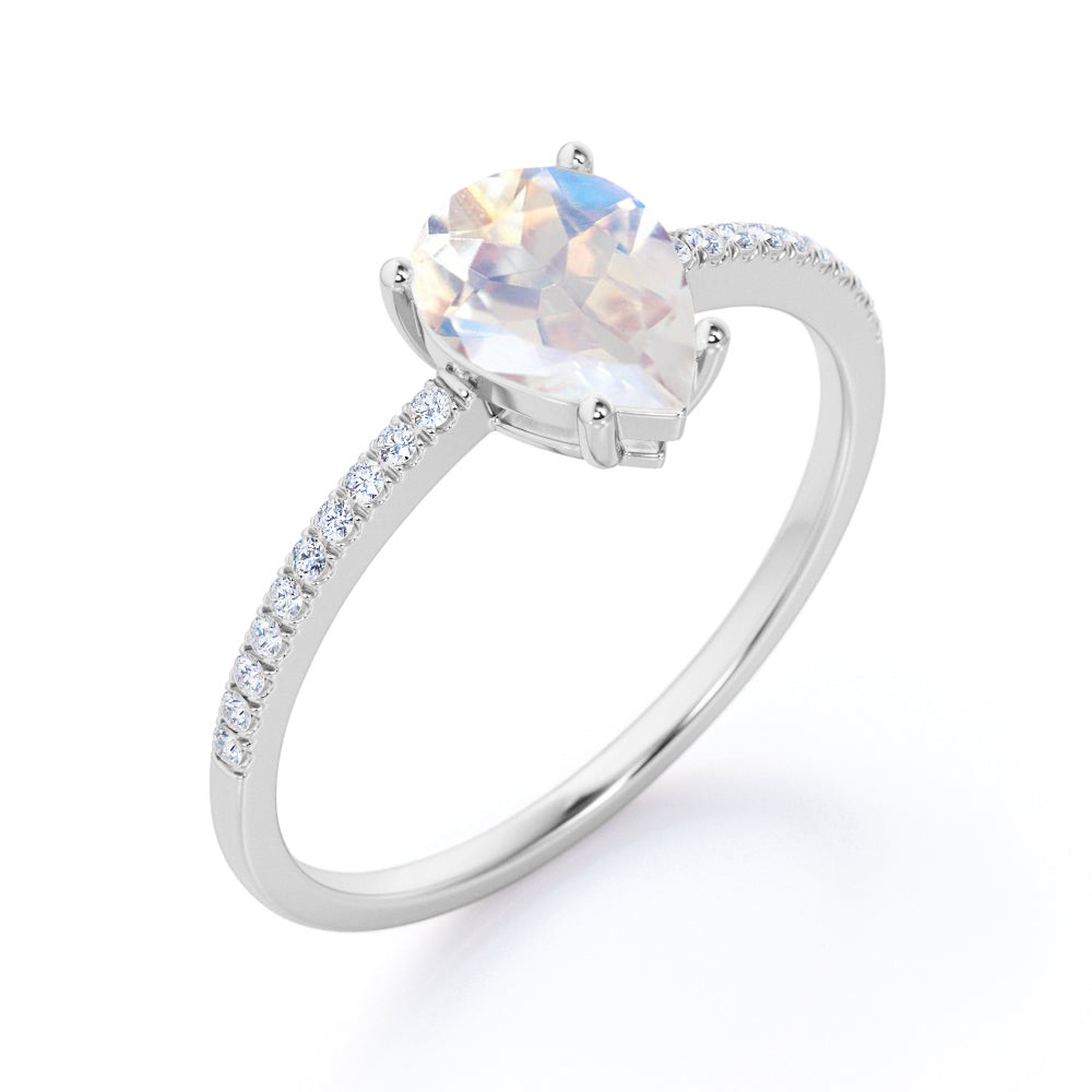 Affordable 1.25 carat Pear shaped Moonstone and diamond half-eternity engagement ring in Rose gold