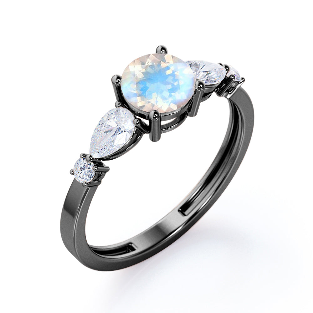 Modern 1.15 carat Round cut Blue Moonstone and diamond marquise 5 stone engagement ring in Rose gold