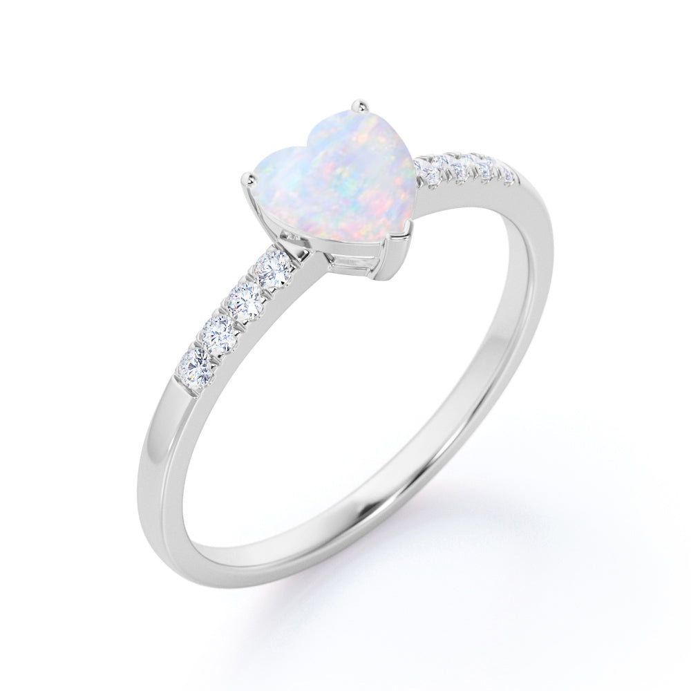 Vintage inspired 1.10 carat heart shaped Ethiopian Opal and diamond pave set engagement ring for her in Rose gold