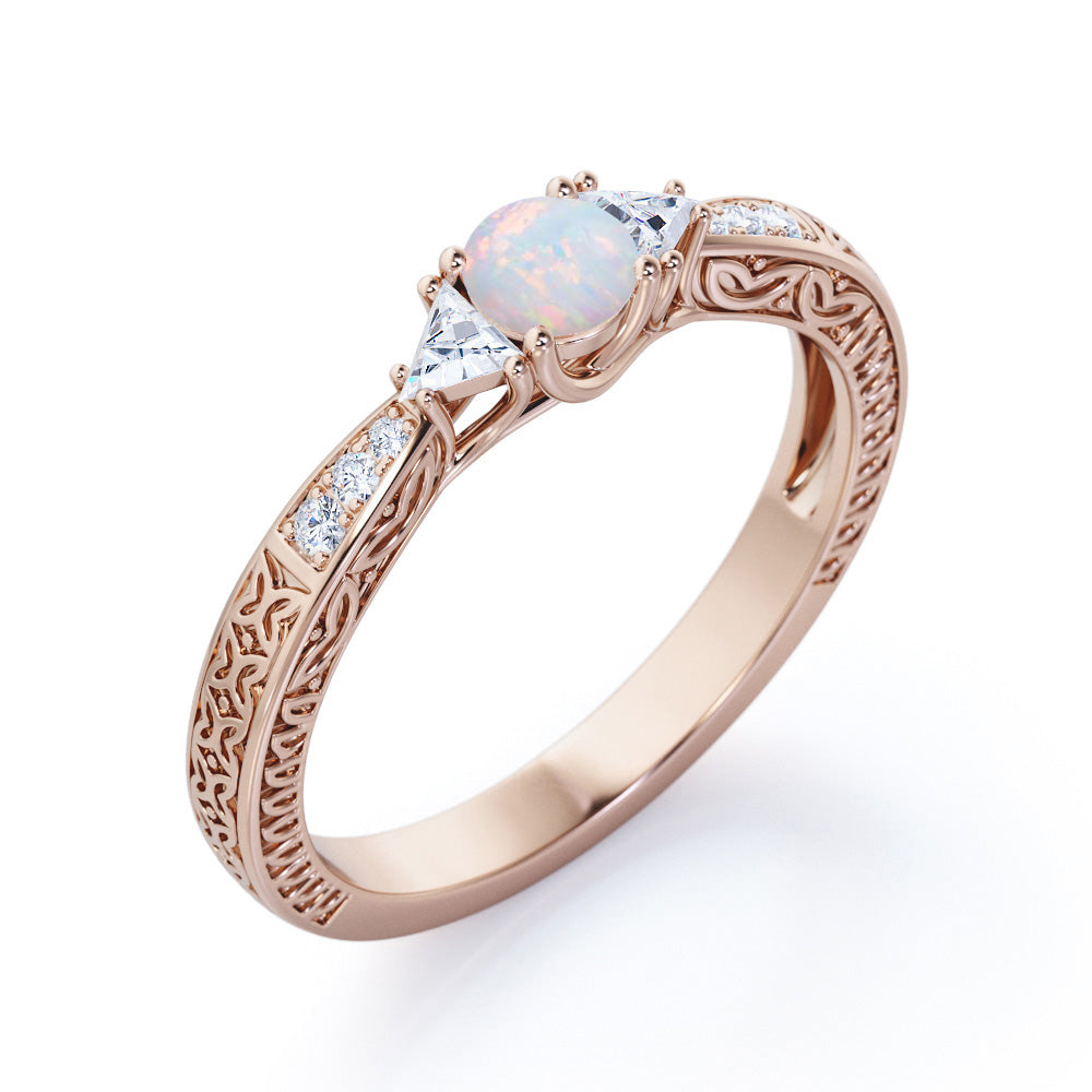 Contemporary style Filigree 0.75 carat Round cut Ethiopian Opal and diamond triangle engagement ring for her
