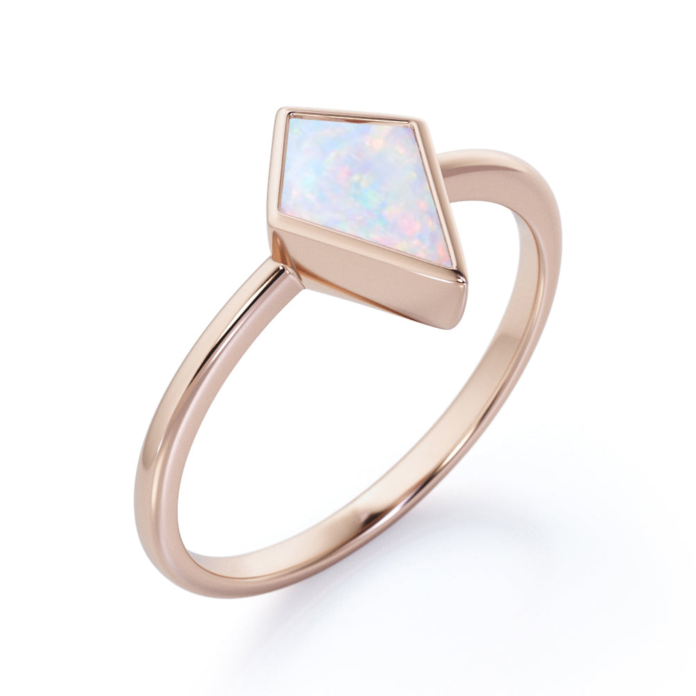 Solitaire Bezel 1 carat Kite shaped Ethiopian Welo Opal tapered shank engagement ring in Rose gold