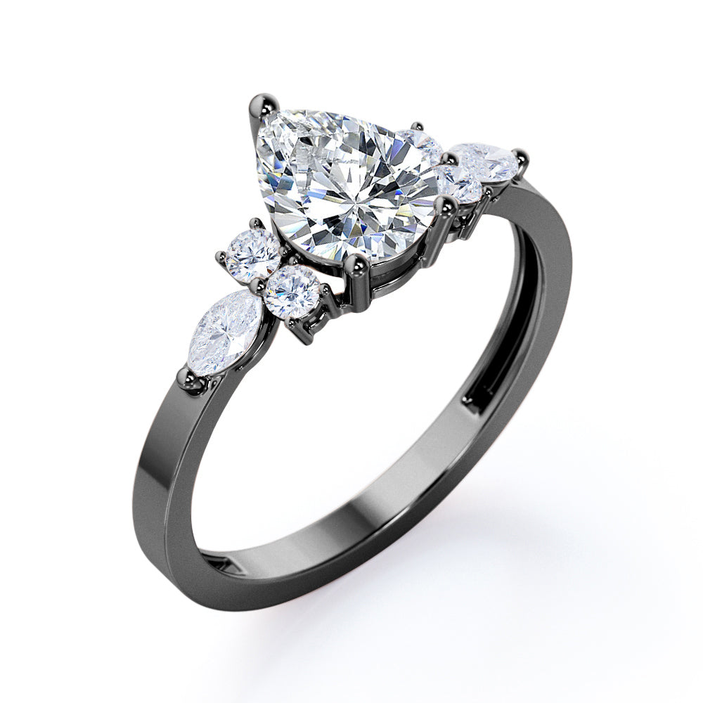 Antique 7 stone 1.1 carat Pear Shaped Moissanite and diamond 3 prong engagement ring in Rose gold