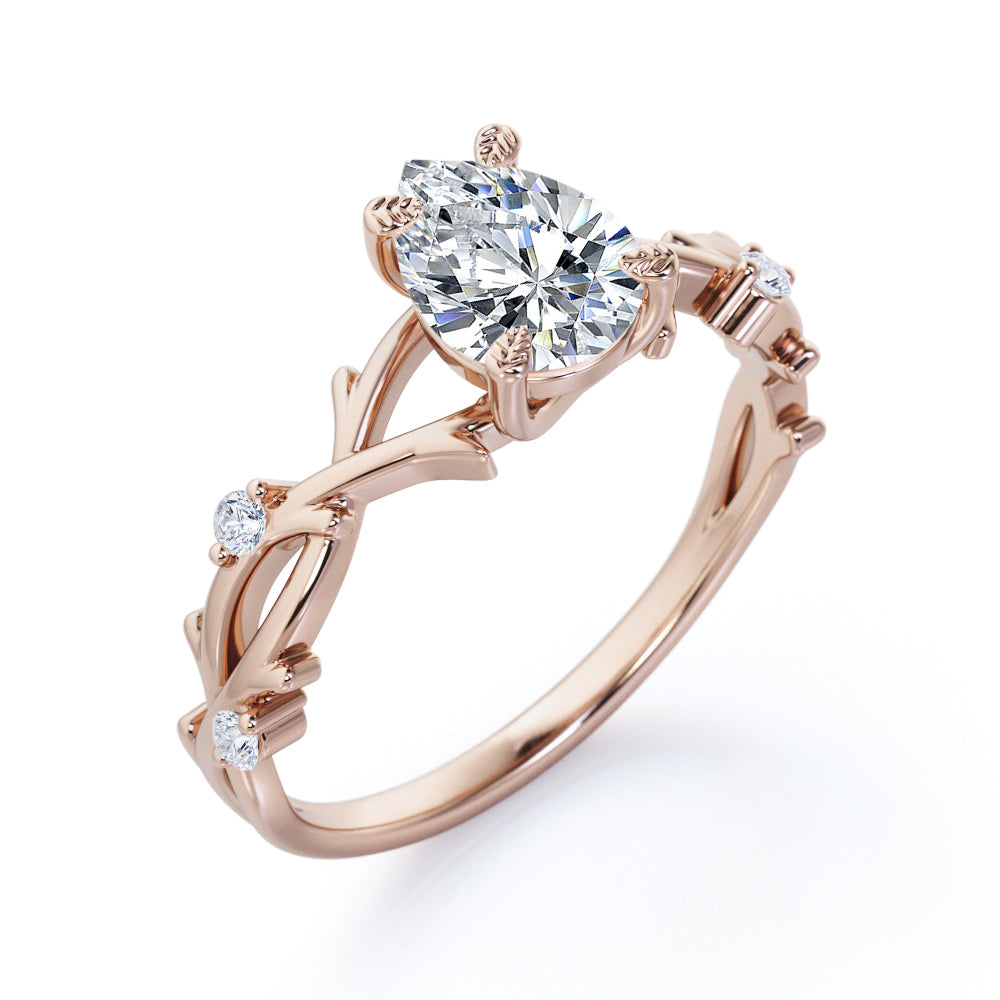 Artistic twig inspired 1 carat Pear cut Moissanite and diamond earthy engagement ring in Black gold