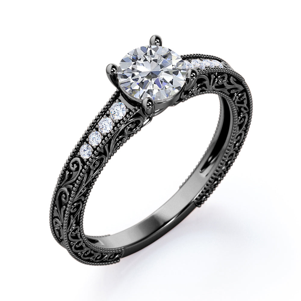 Artistic filigree 1.1 carat Moissanite and diamond low-basket setting engagement ring in White gold