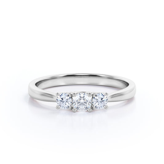 Pinched shank 0.65 carat Round cut Moissanite and diamond trellis engagement ring in White gold