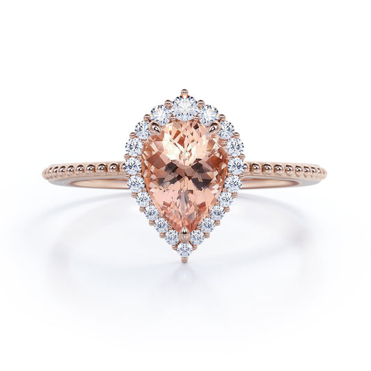 Eccentric Halo 1.25 carat Pear cut Morganite and diamond engraved vintage style engagement ring in Rose gold