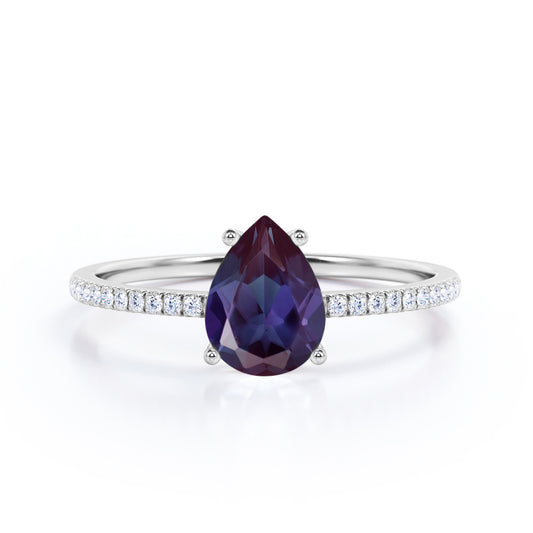 Classic 1.25 carat Pear cut Alexandrite and diamond eternity engagement ring in White gold