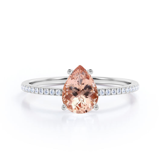 Classic eternity 1.25 carat Pear cut Morganite and diamond pave set engagement ring in White gold