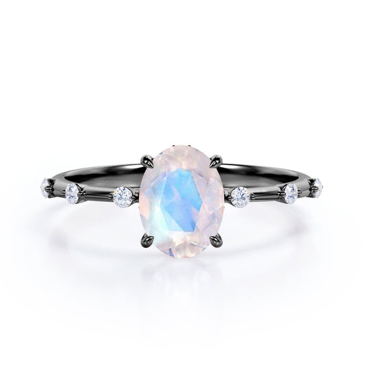 Branch Twig 1.1 carat Oval shaped Moonstone and diamond dainty engagement ring in Black gold