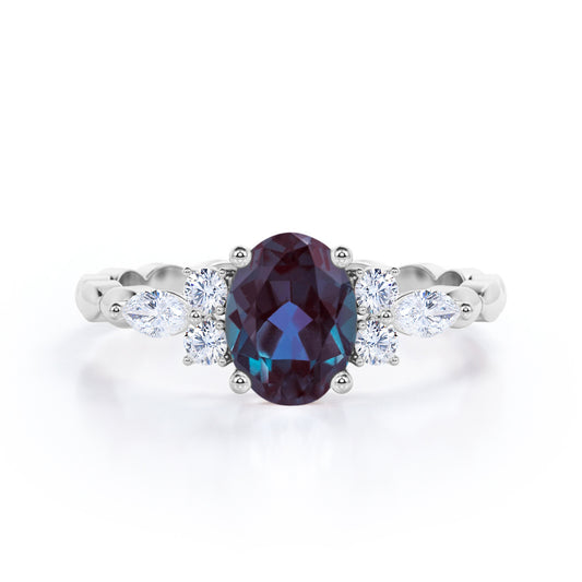 Scalloped bands 1.1 carat Oval cut Lab made Alexandrite and diamond prong style setting engagement ring in White gold