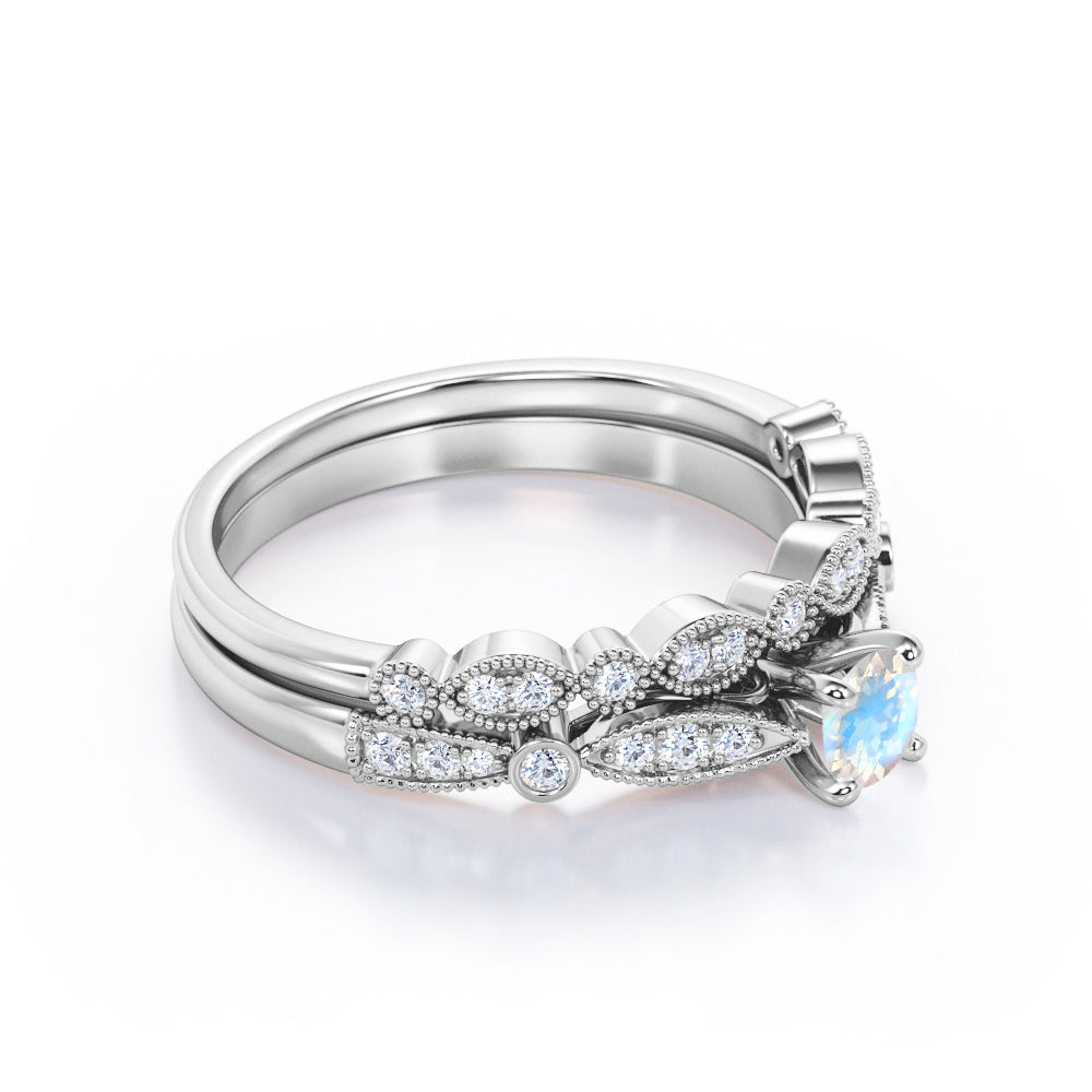 Double Milgrain 1.5 carat Round cut Rainbow Moonstone and diamond cathedral pave engagement ring in White gold