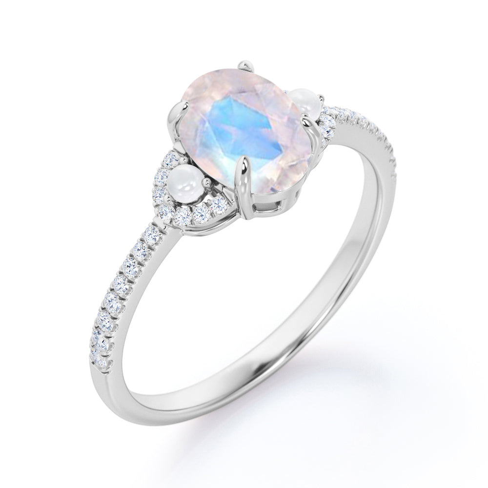Pretty Pearls 1.5 carat Oval cut Moonstone and diamond traditional engagement ring in White gold