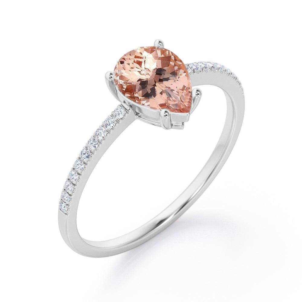 Classic eternity 1.25 carat Pear cut Morganite and diamond pave set engagement ring in White gold